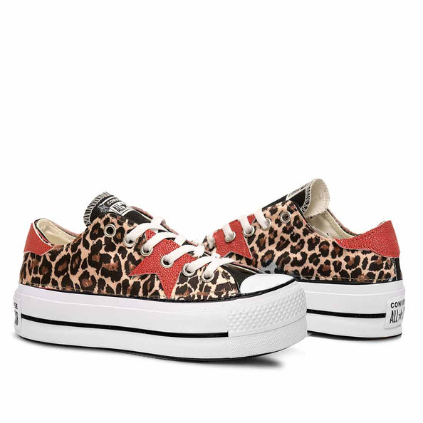 Converse all star basse con stella rossa in pelle leopardate 